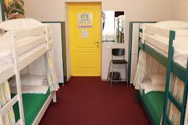 Clean and modern hostel bathroom with shower and proper sanitation